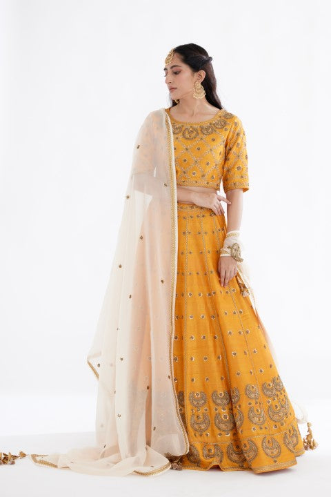 Ochre Yellow Lehenga Paired with Blouse and Cream Dupatta