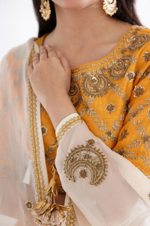 Ochre Yellow Lehenga Paired with Blouse and Cream Dupatta