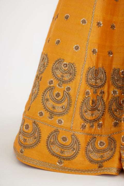 Ochre Yellow Lehenga Paired with Blouse and Cream Dupatta