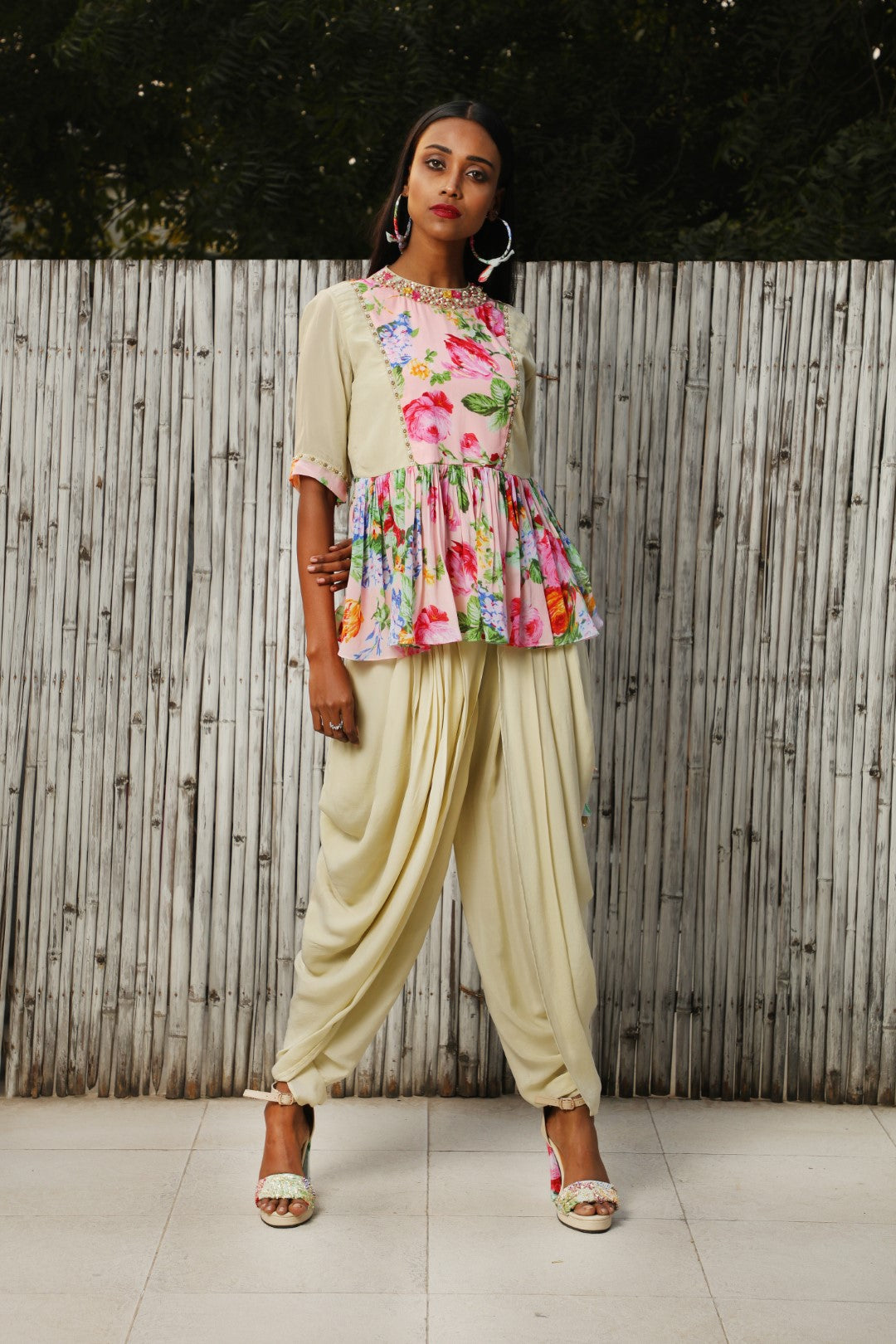 Antique jade crepe top with soft pink vintage rose panel teamed with an antique jade crepe dhoti.