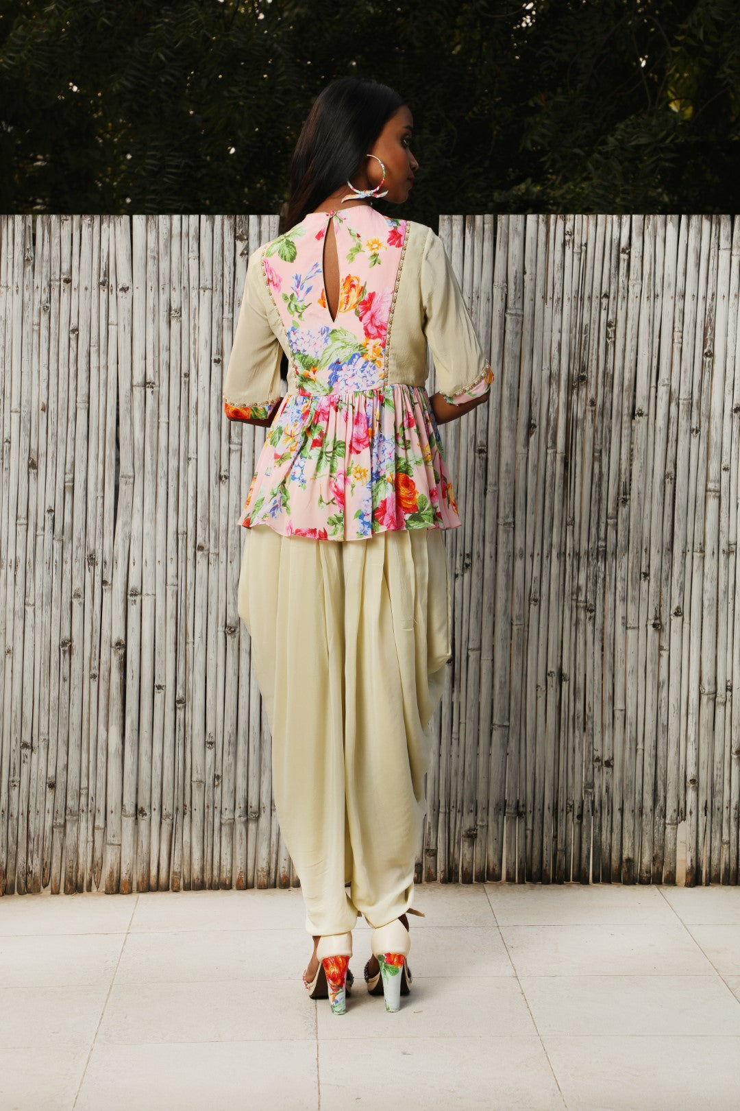 Antique jade crepe top with soft pink vintage rose panel teamed with an antique jade crepe dhoti.