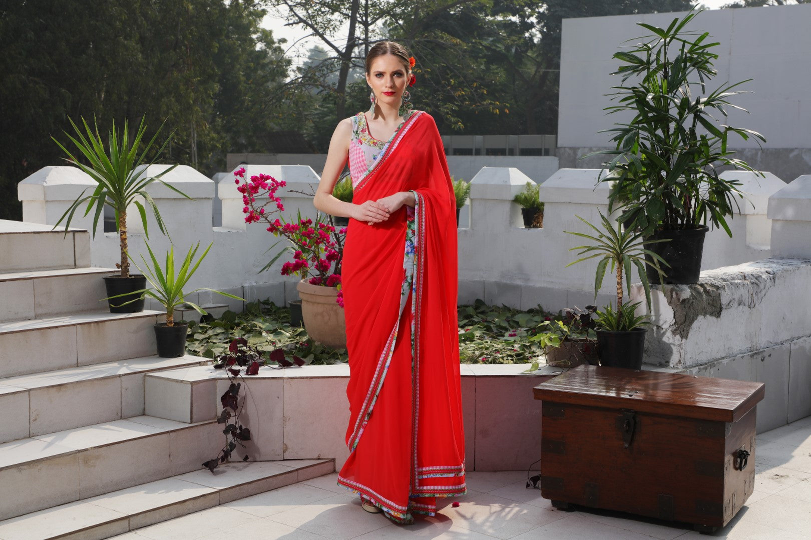 Plain gajajri georgette saree with vintage rose and checks border.