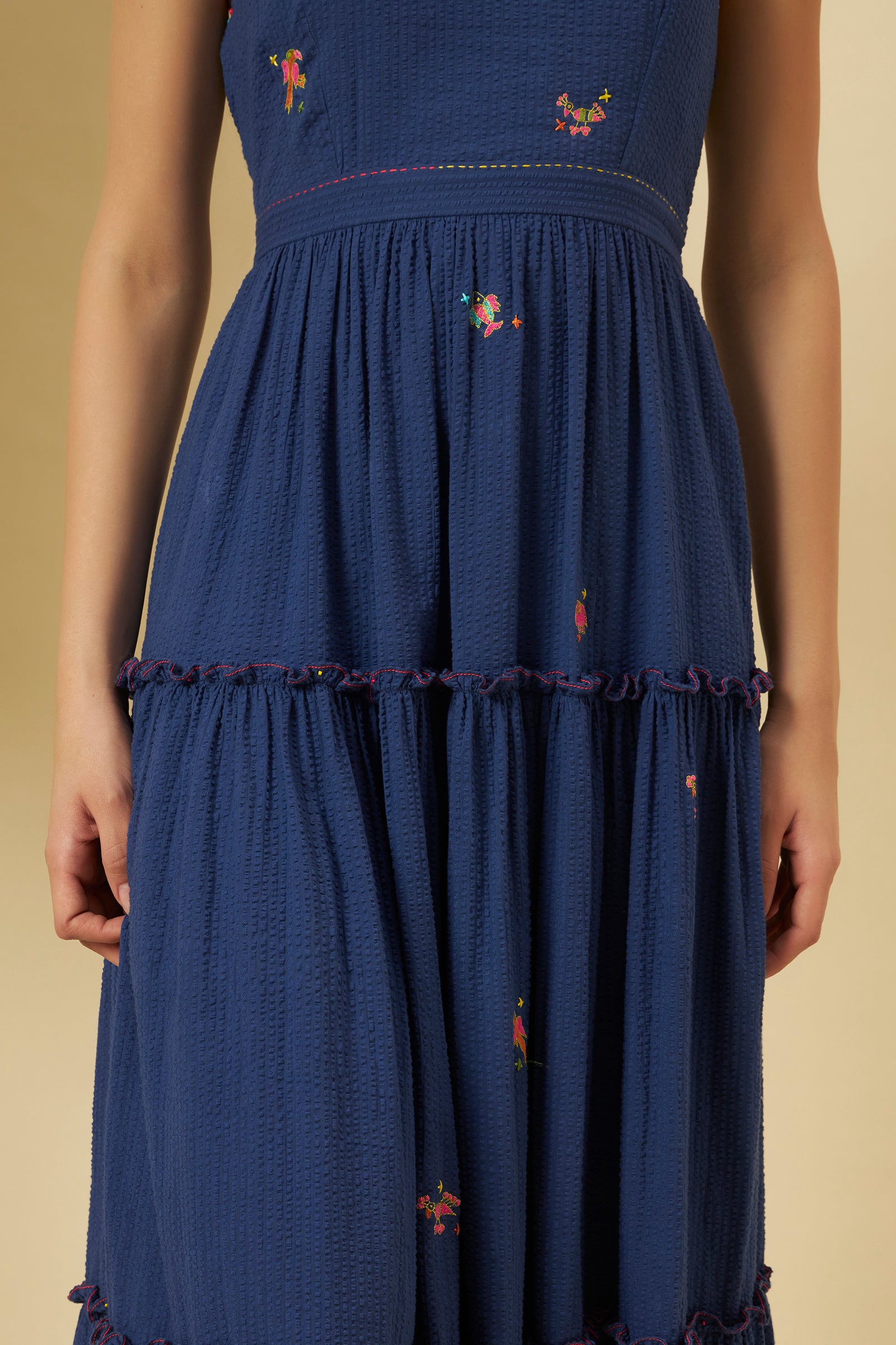 INDIGO SEERSUCKER HALTER TIERED DRESS