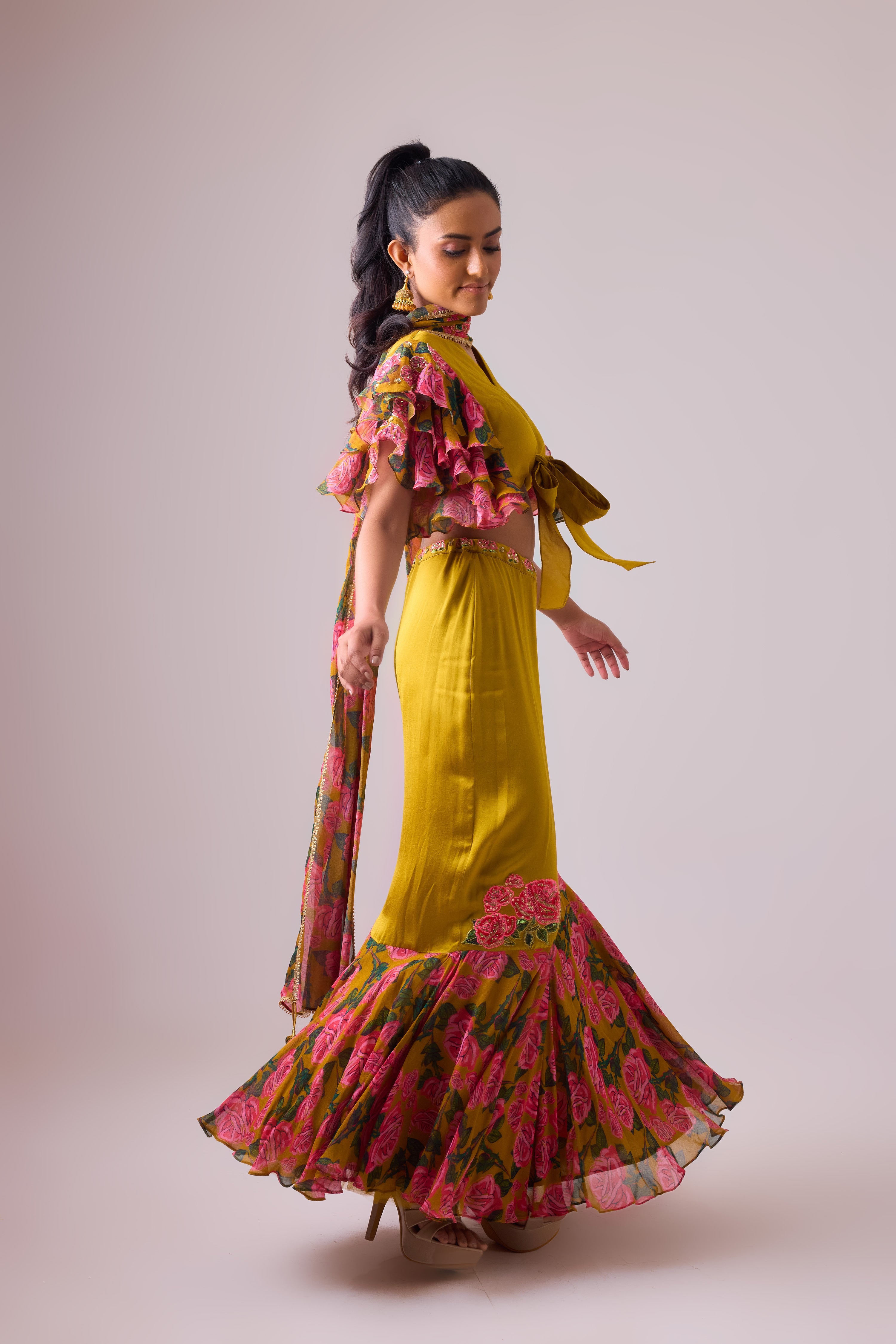 OCHRE LEHENGA  WITH TWIST  OF FRILLS     AND BLOUSE WITH FLARED SLEEVES