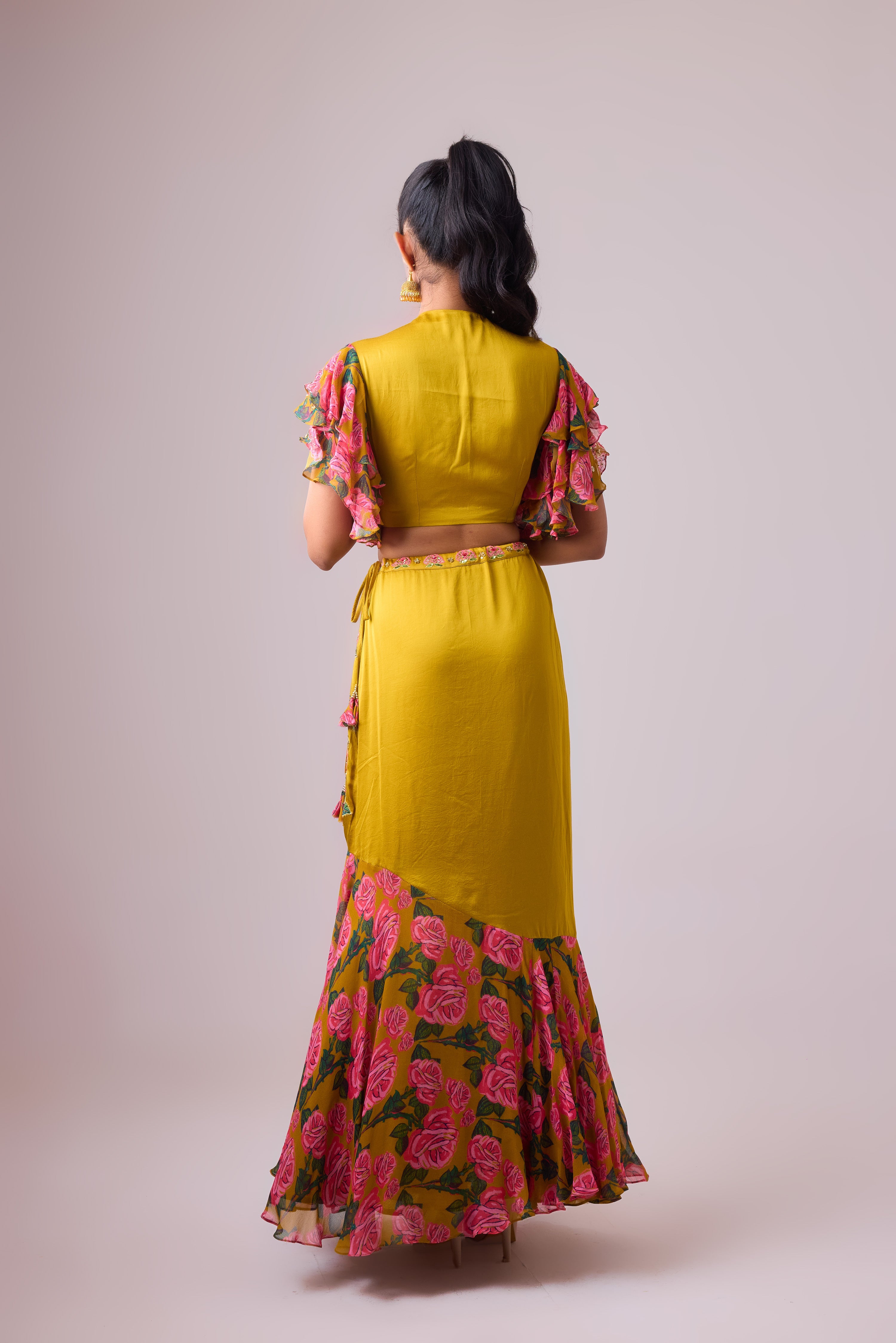 OCHRE LEHENGA  WITH TWIST  OF FRILLS     AND BLOUSE WITH FLARED SLEEVES