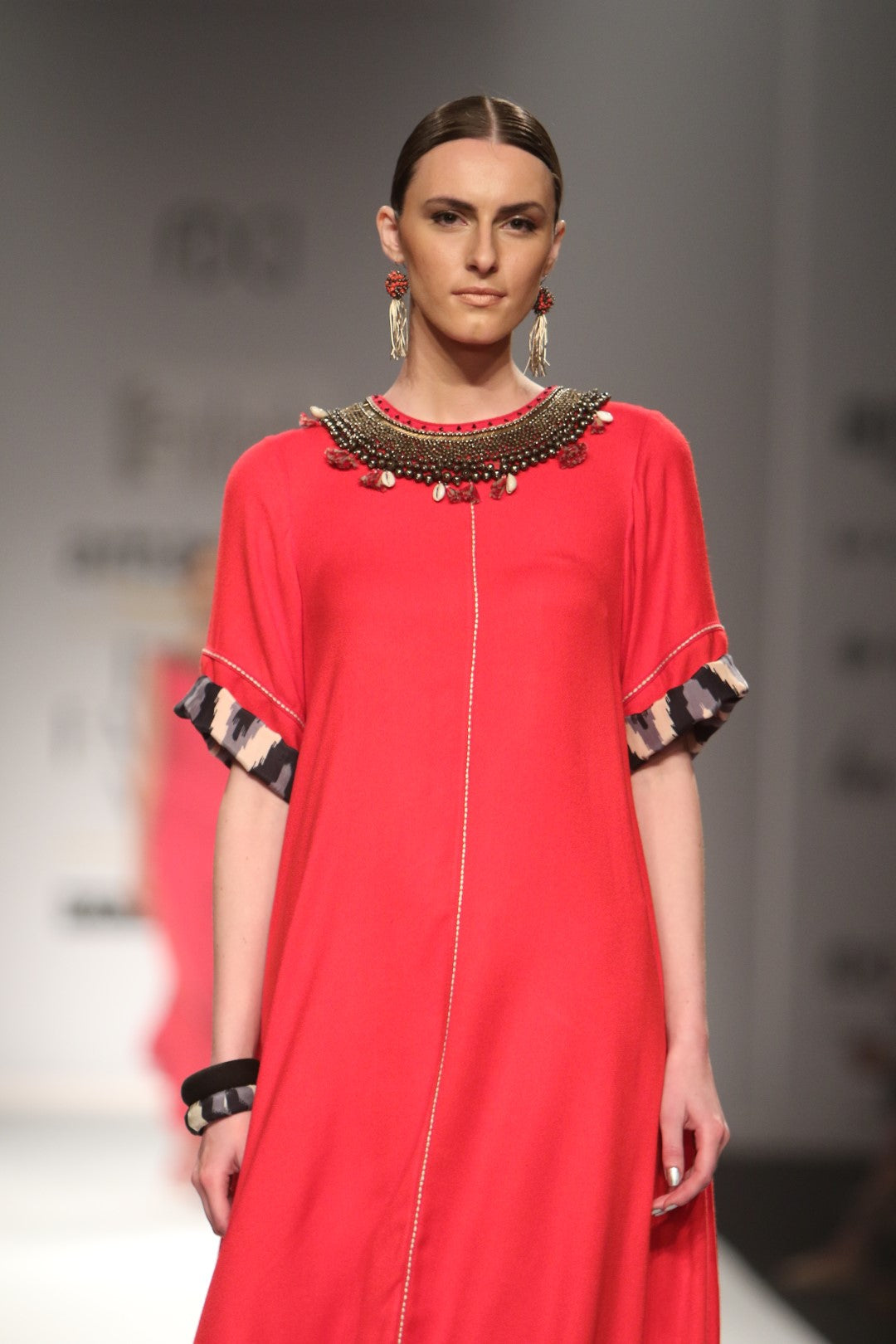 Asymmetric embroidered dress with gathered skirt