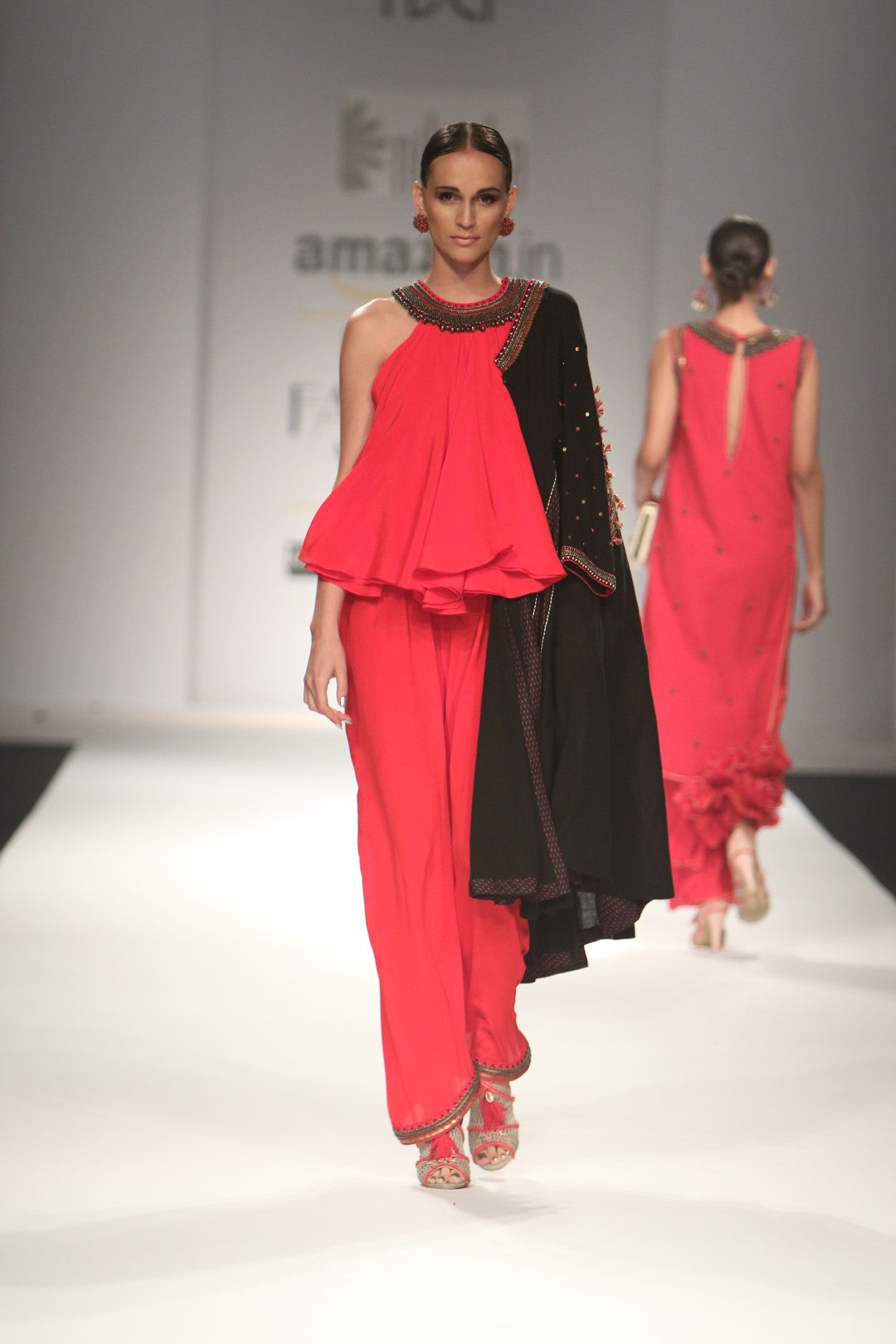 Red silk kali jumpsuit with long black Khadi kali jacket