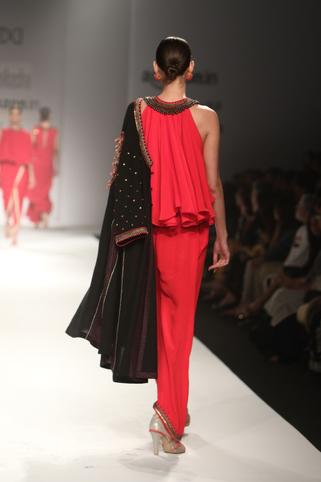 Red silk kali jumpsuit with long black Khadi kali jacket