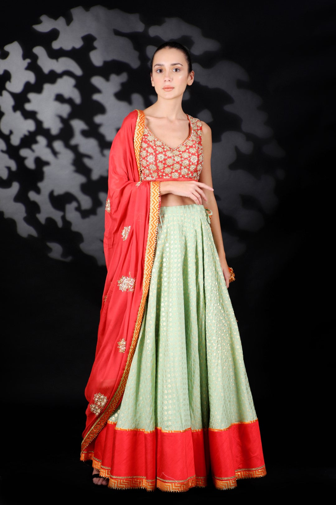 Coral Red Matka Silk Embroidered Blouse with Cotton Silk Gold Print Lehenga & Emb Dupatta
