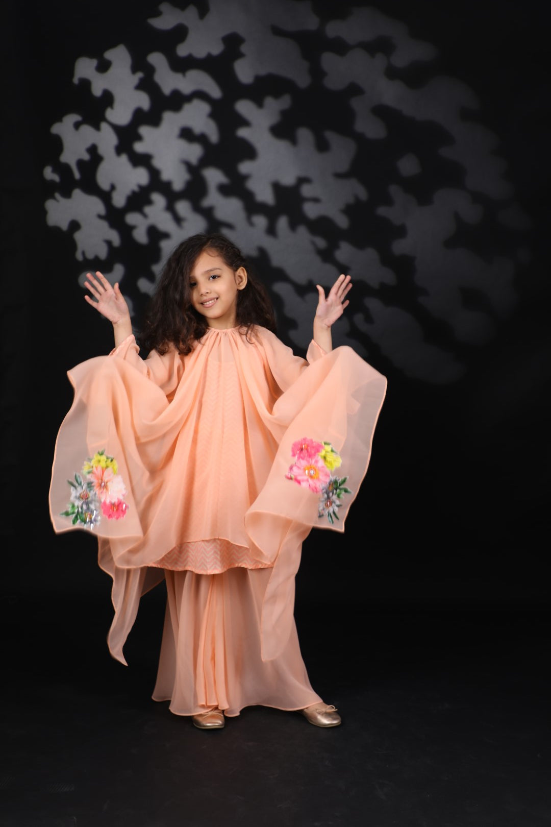 Salmon Asym Ggt Tunic with floral details paired with Pant