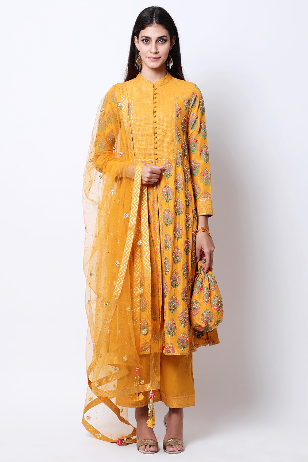 Ochre hand-printed kurta with dupatta and pants.