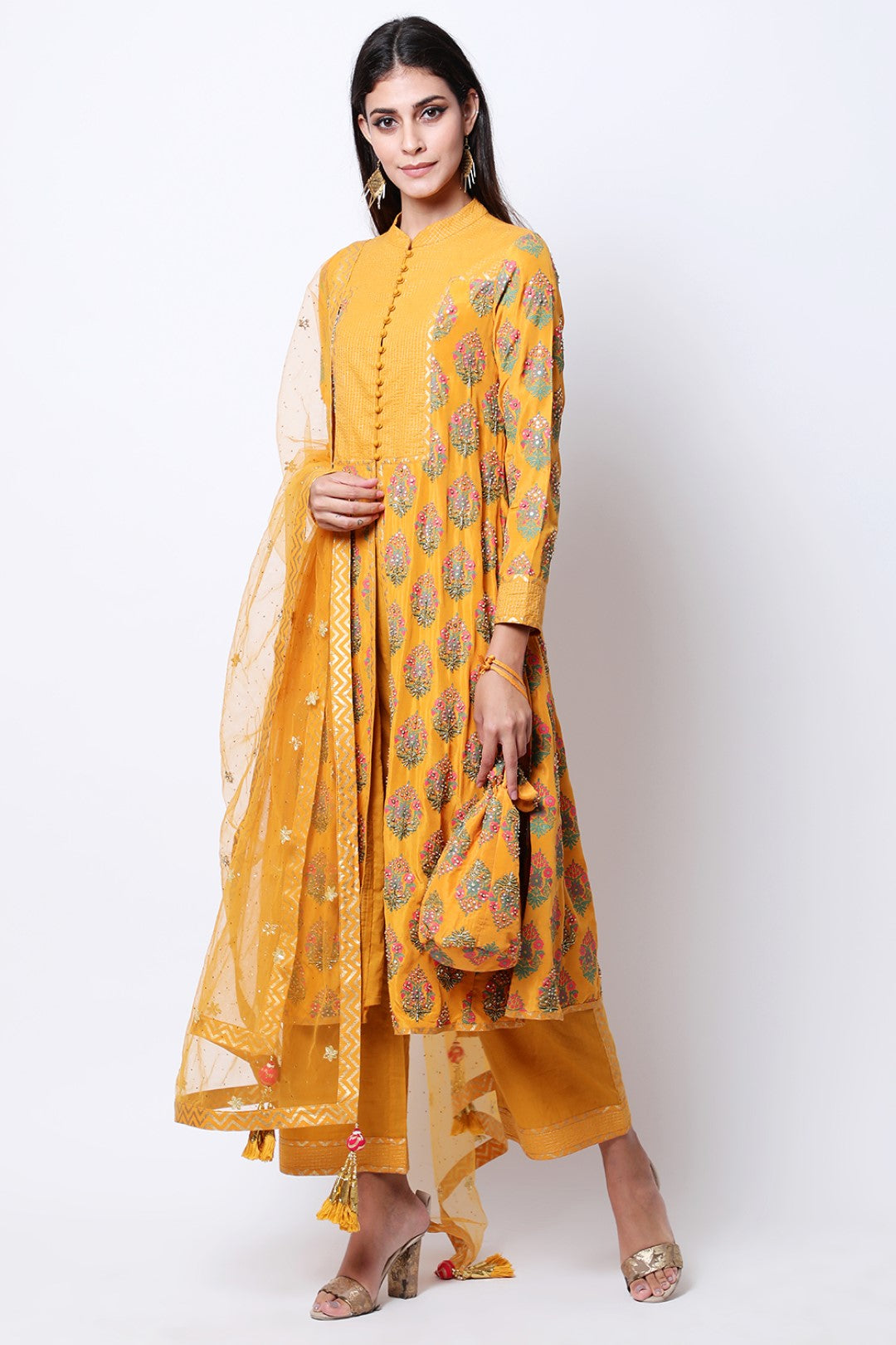 Ochre hand-printed kurta with dupatta and pants.