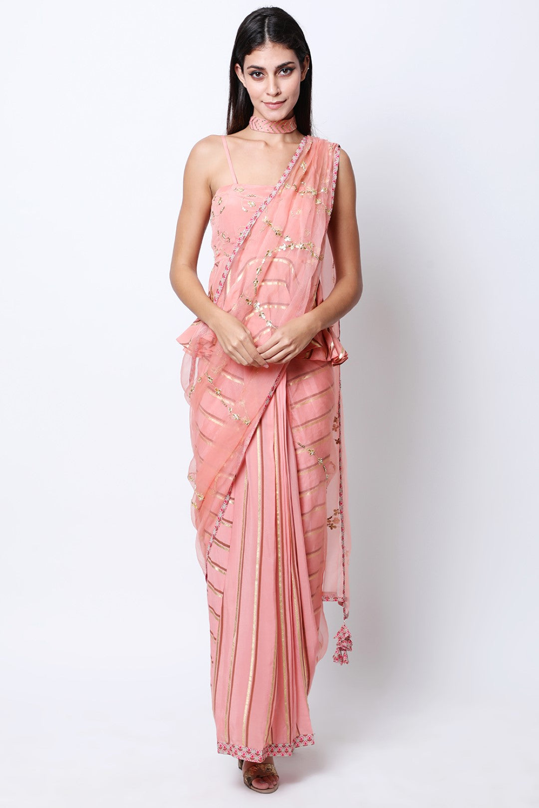 Vintage rose leheriya pre-pleated crepe saree with embroidered drape and peplum embroidered blouse.