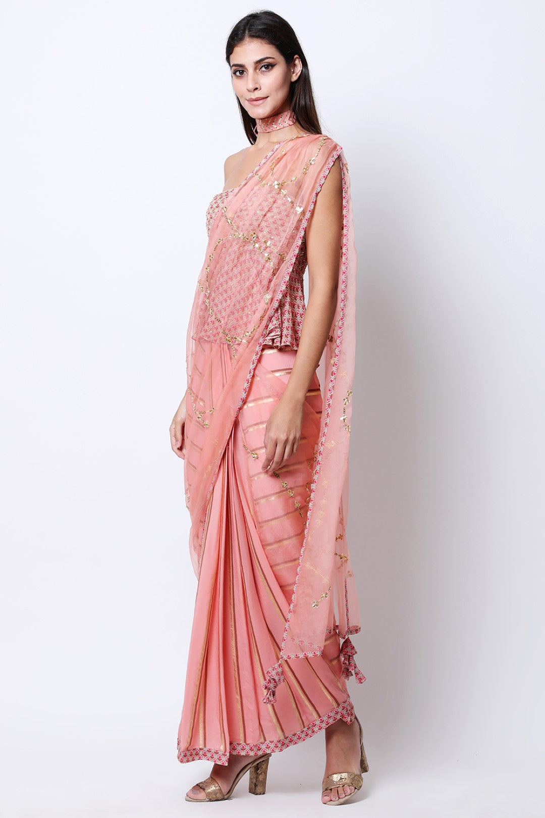 Vintage rose leheriya pre-pleated crepe saree with embroidered drape and peplum embroidered blouse.