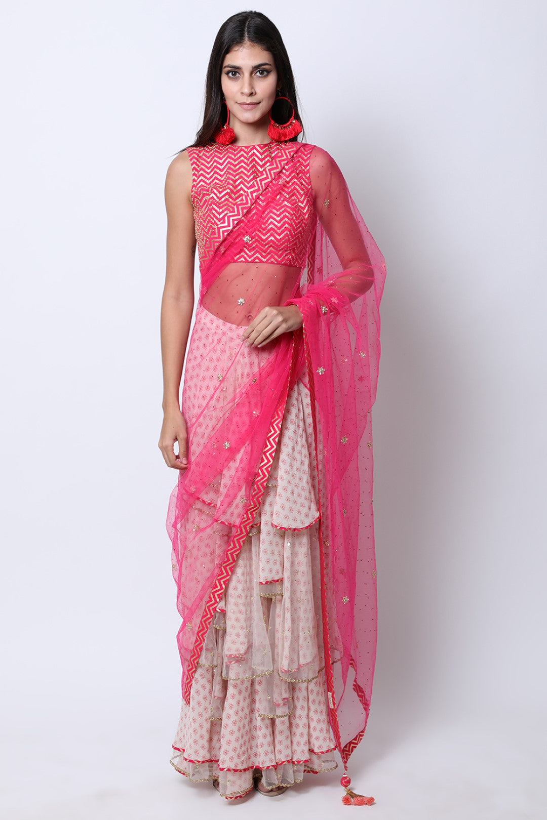 Rani Pink blouse with ghee print double layer godets skirt with attached embroidered palla.
