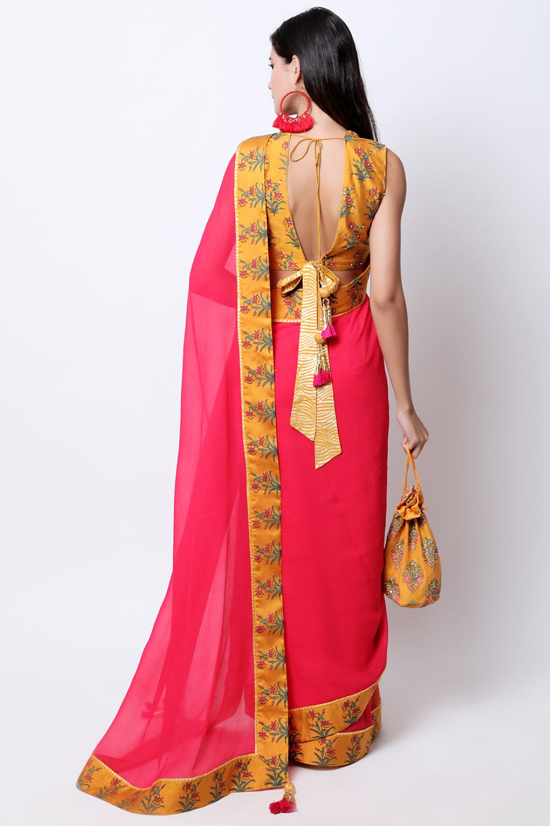 Rose Red chiffon saree , paired with ochre hand embroidered teen phool guldasta blouse.