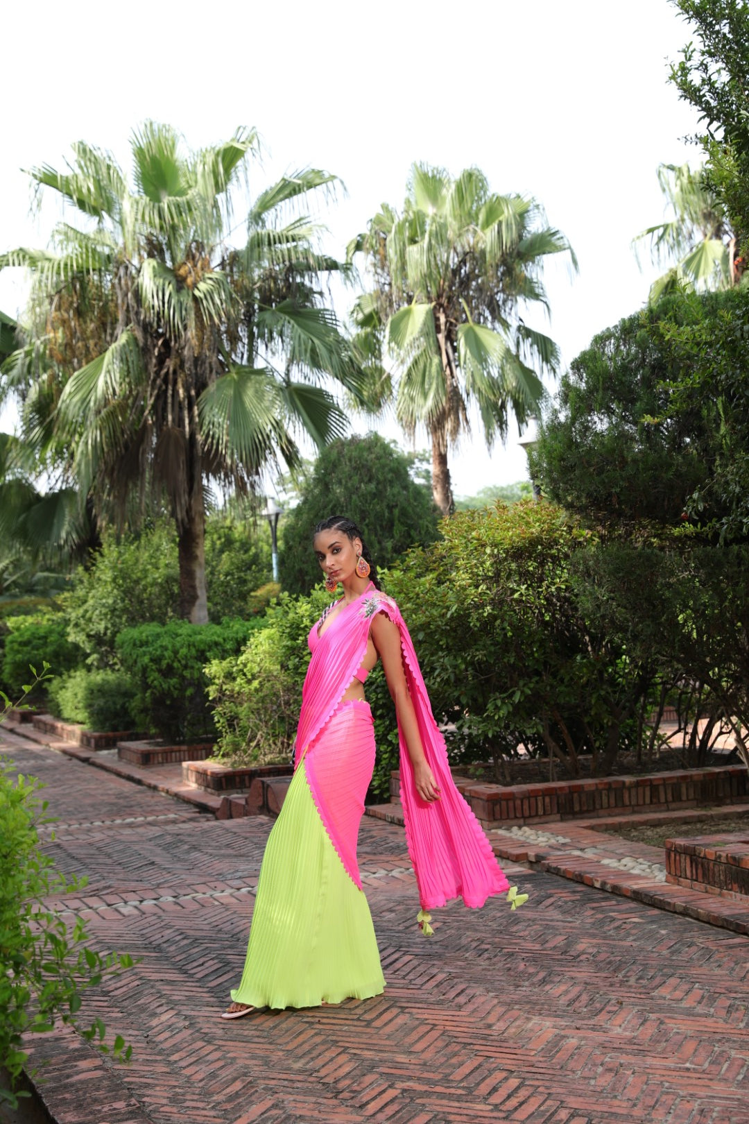 Lime pre-pleated ggt saree with pink palla with pink unstitched blouse fabric