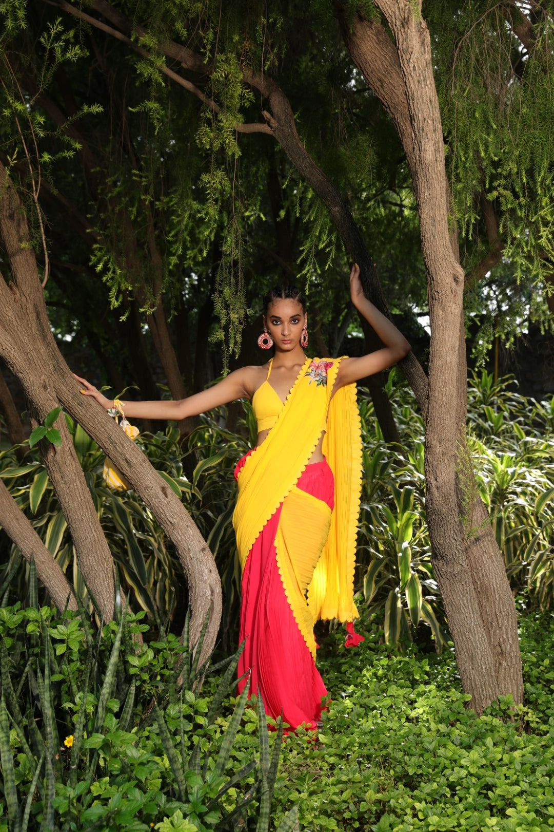 Coral pre-pleated saree with yellow palla with yellow unstitched blouse fabric