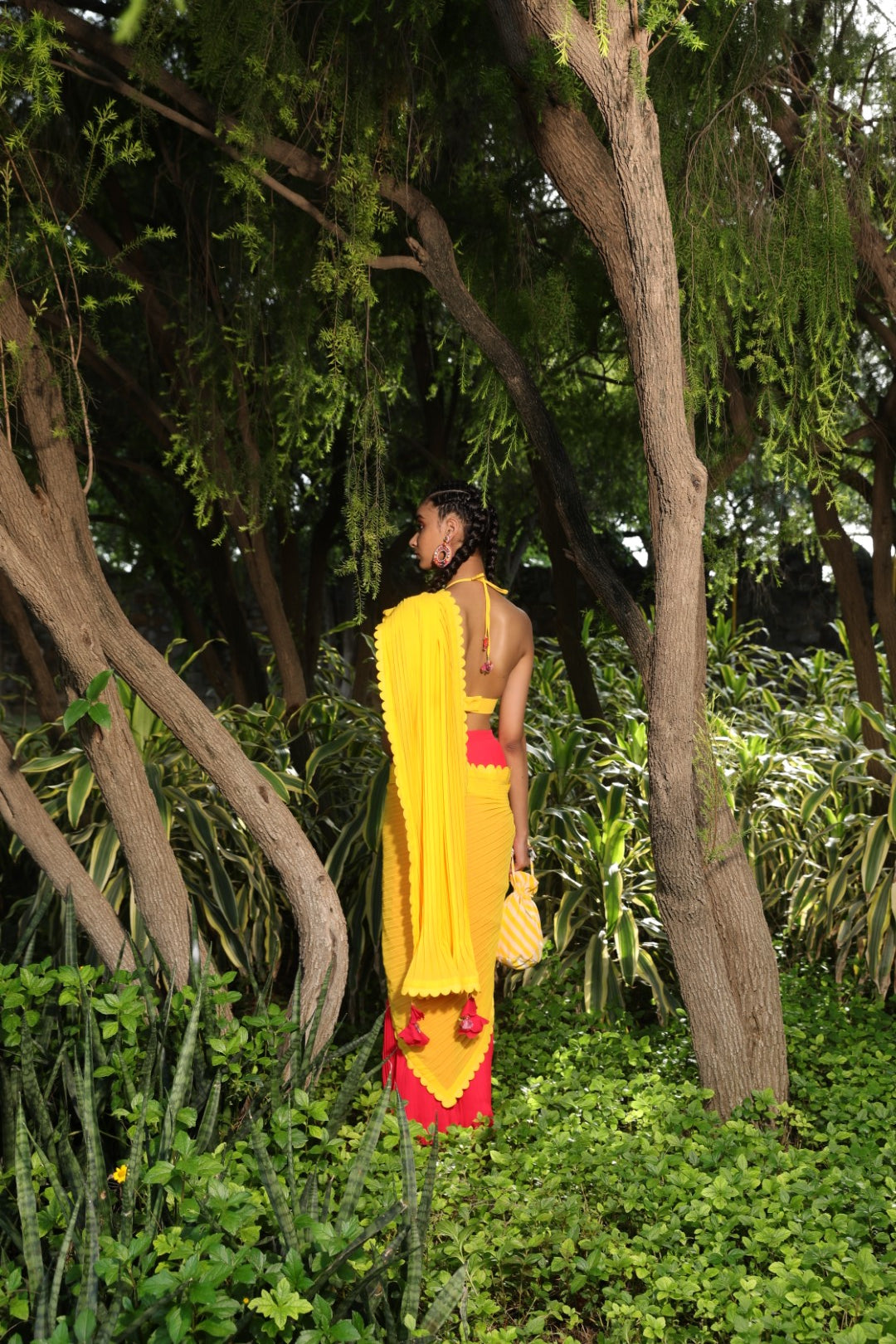 Coral pre-pleated saree with yellow palla with yellow unstitched blouse fabric