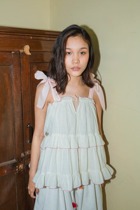 Hand Woven Cotton Emb. Tie-up Ruffled Cami Top with MulMul Lining And Tassels Details. Azo Free