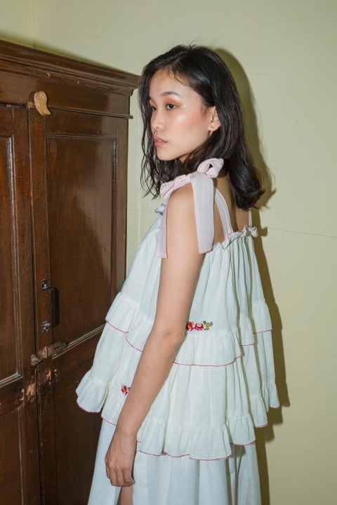 Hand Woven Cotton Emb. Tie-up Ruffled Cami Top with MulMul Lining And Tassels Details. Azo Free