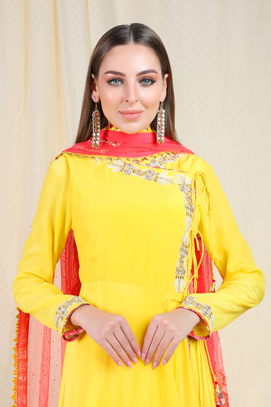 yellow crepe angrakha with coral net dupatta