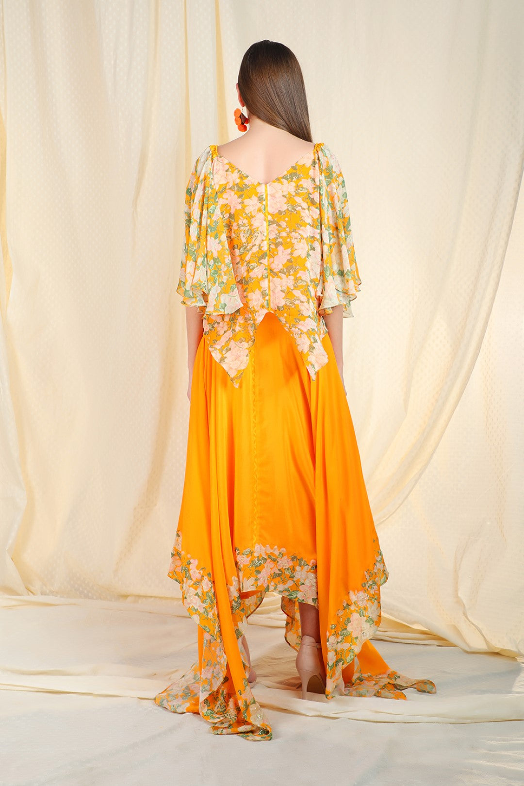 orange crepe asymetric top and skirt