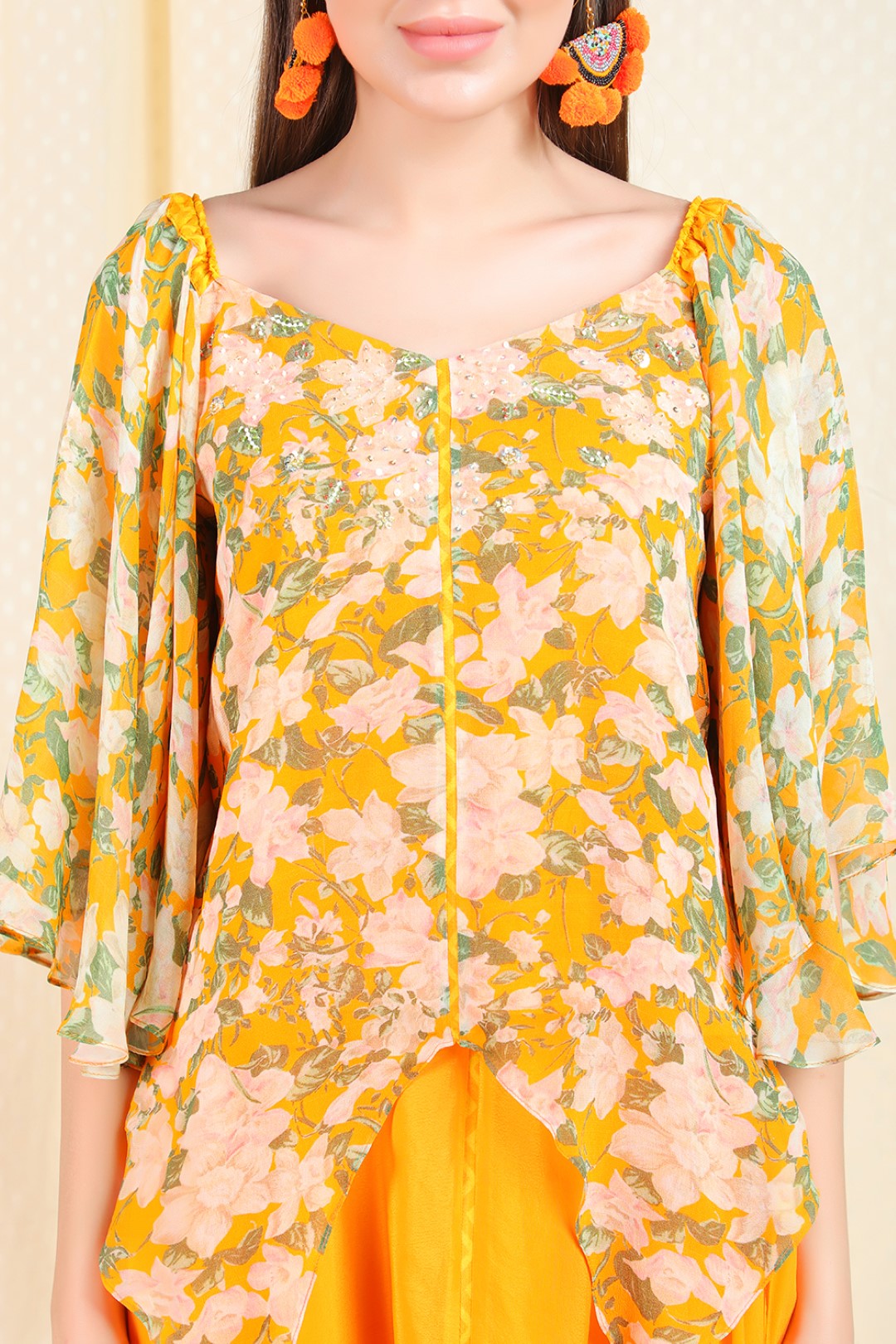 orange crepe asymetric top and skirt