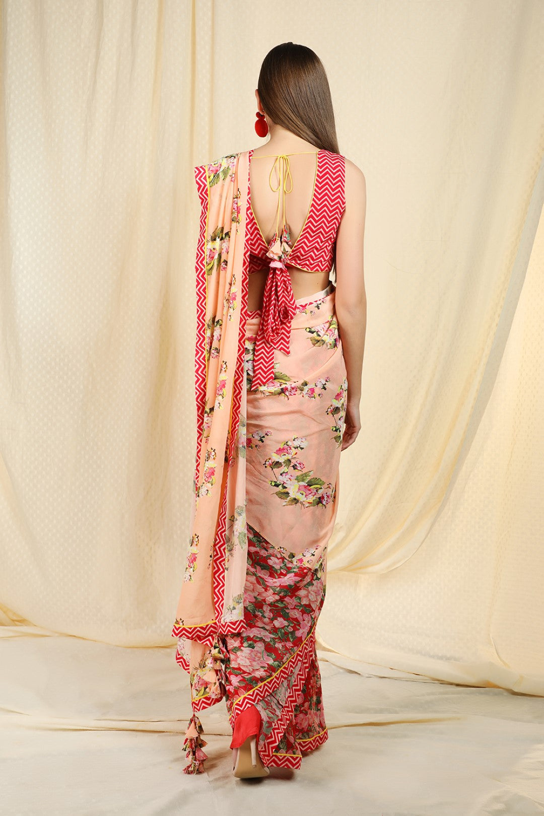 pre-pleated peach saree