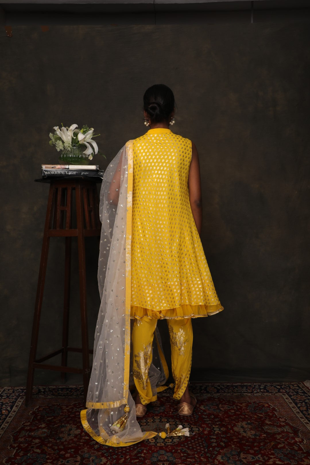Yellow crepe hand gold printed tunic with patiala and ghee dupatta