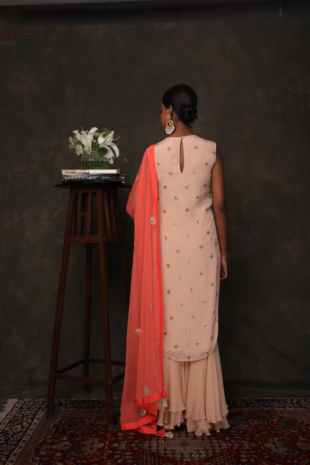 Caramel crepe Kurta with a double layer sharara and coral dupatta