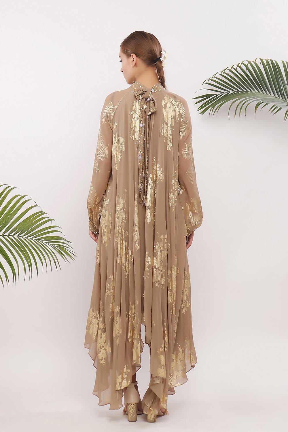 Assymmetrical pleated dress and raglan sleeves with embroidered tie up and culf