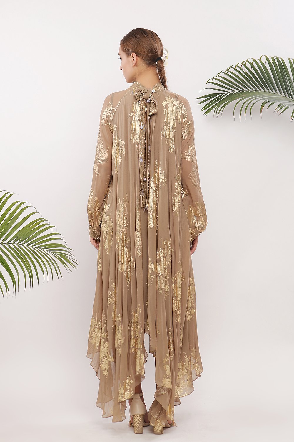 Assymmetrical pleated dress and raglan sleeves with embroidered tie up and culf