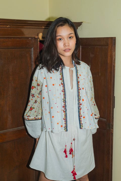 Hand Woven cotton Emb. Box pleated Jacket with Printed Bagru Lining And Tassels Details. Azo free