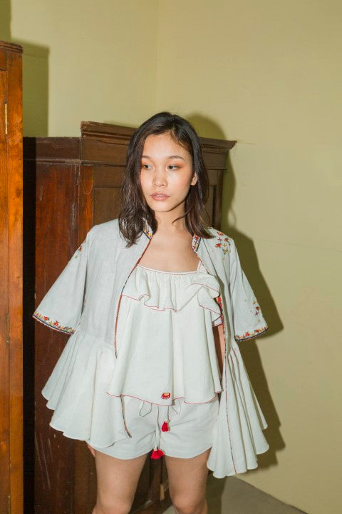 Hand Woven cotton, Emb. Peplum Jacket with Printed Bagru Lining And Tassels Details. Azo free