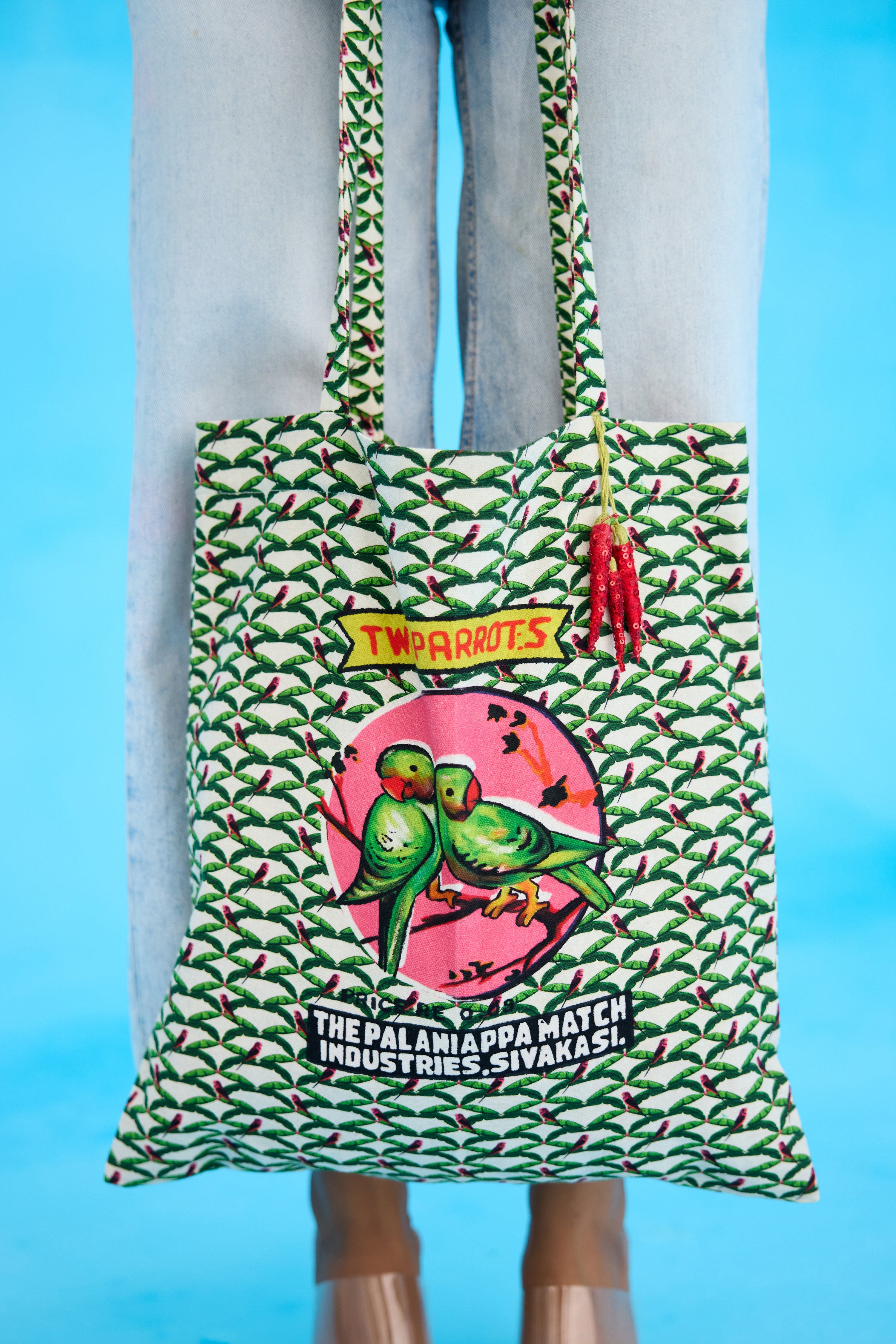 Ivory parakeet tote bag