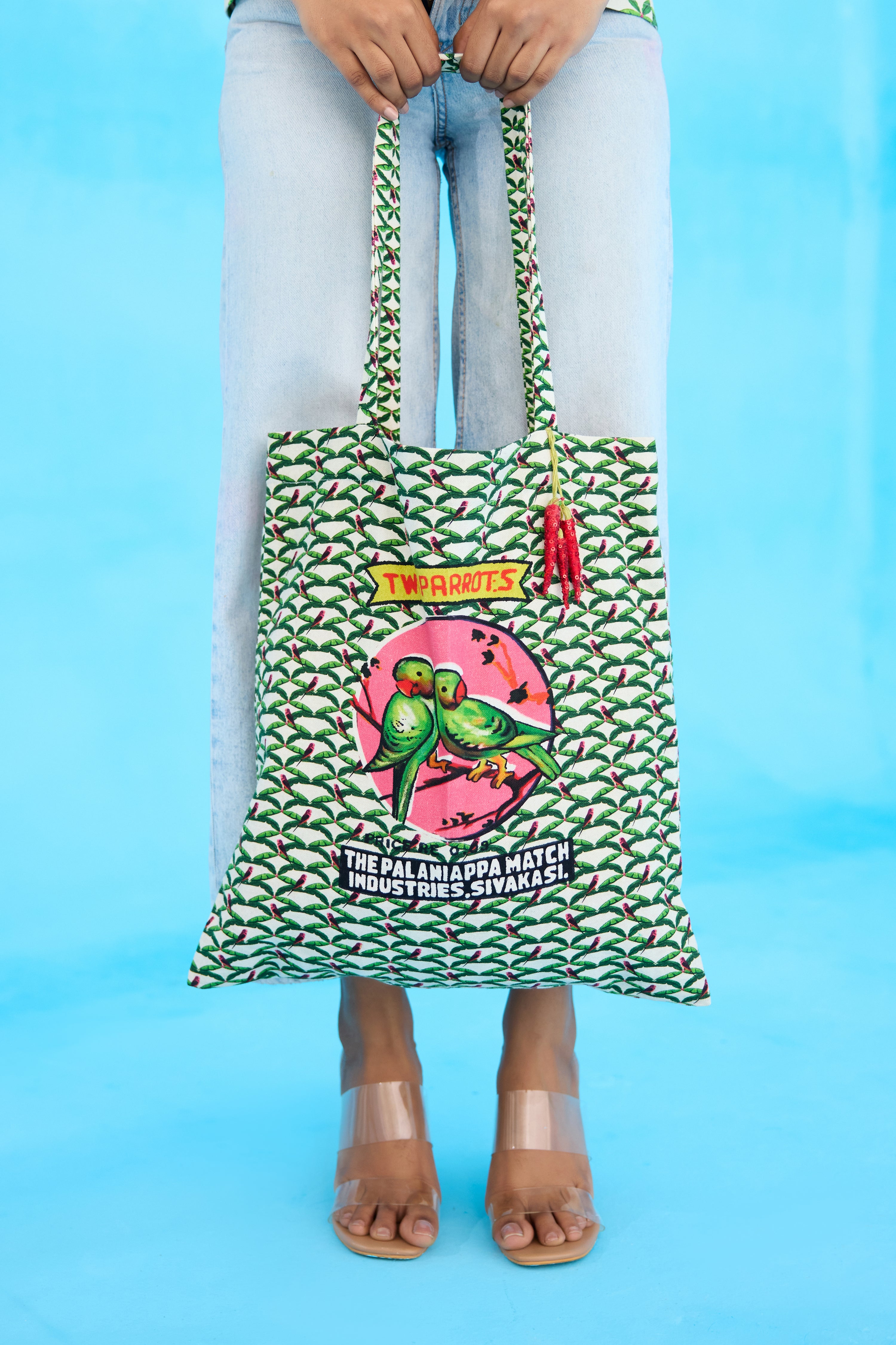Ivory parakeet tote bag