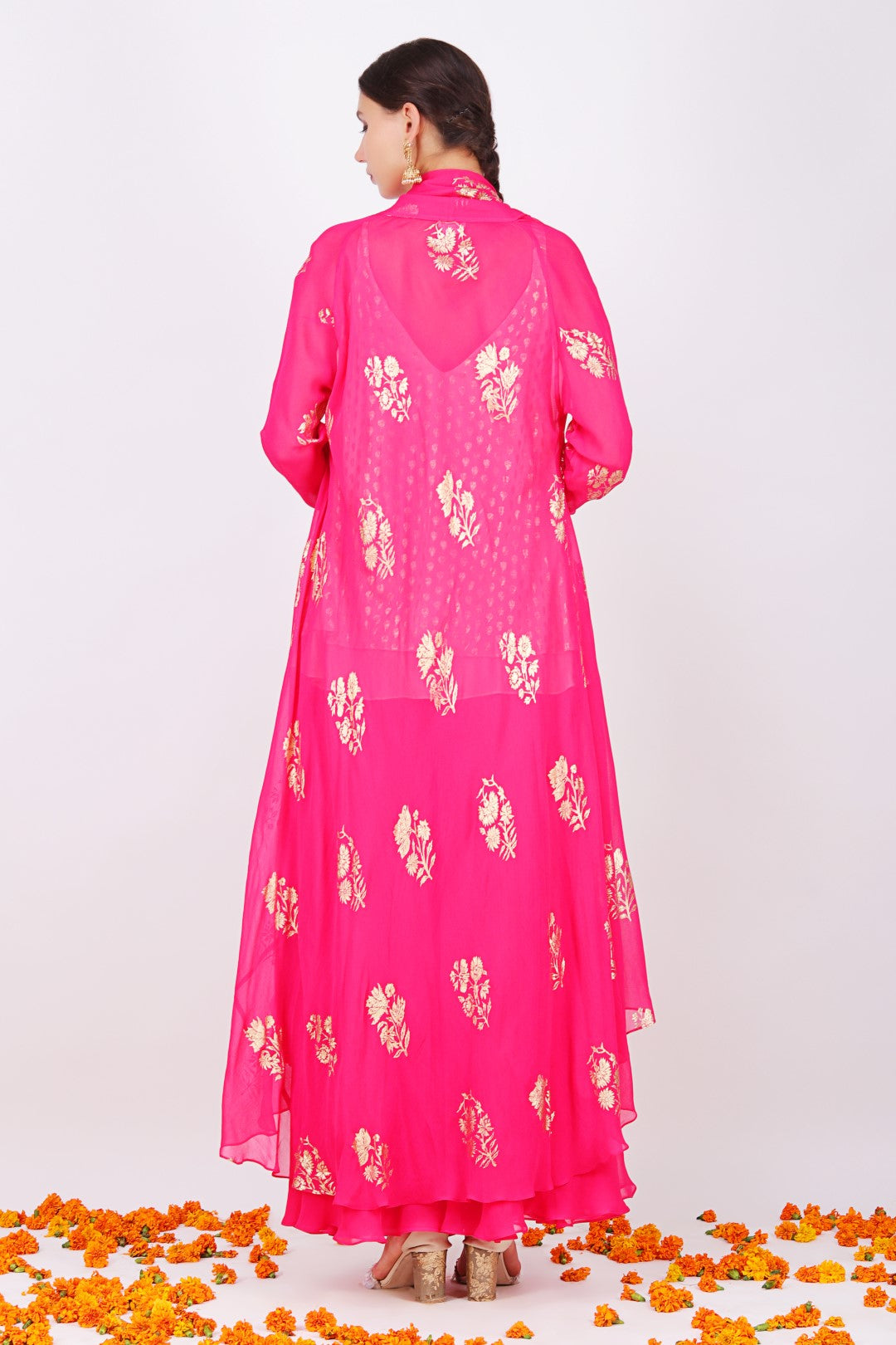Rani pink georgette foil printed shrug with dusky salmon crepe cami top and sharara.