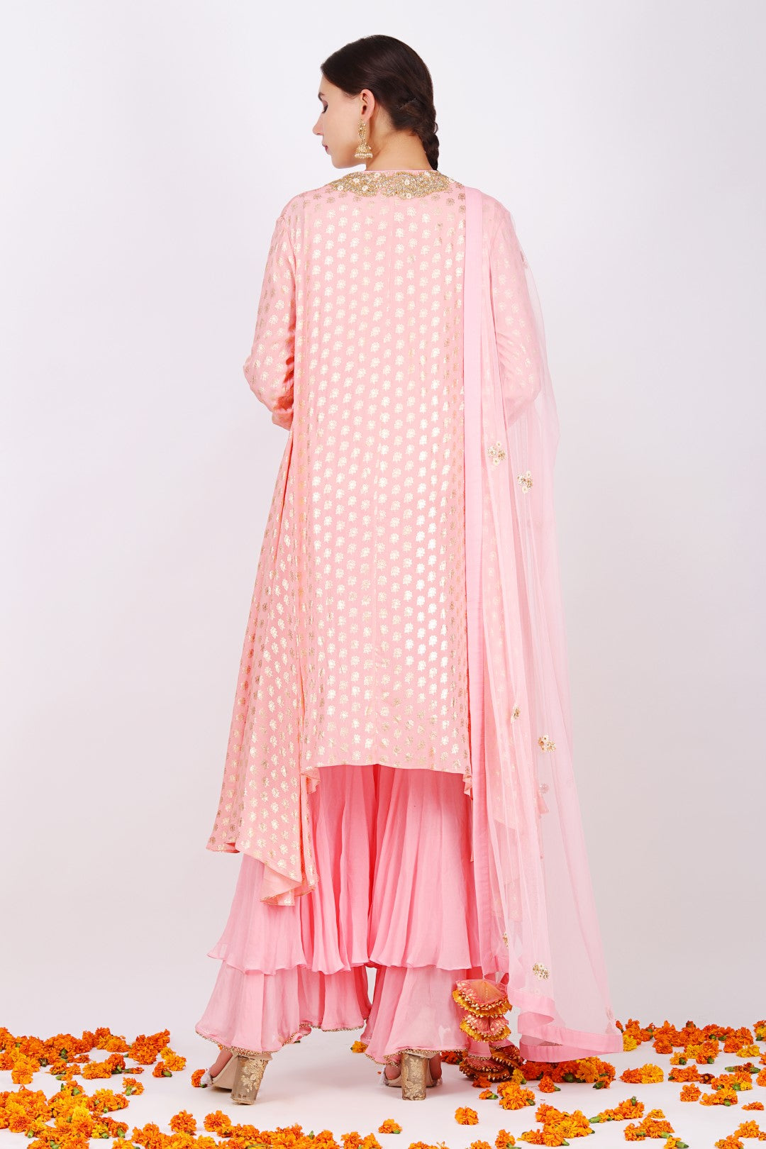 Rose pink crepe lotus foil printed Asymmetrical kurta with georgette double layer sharara and rose pink net embroidered dupatta