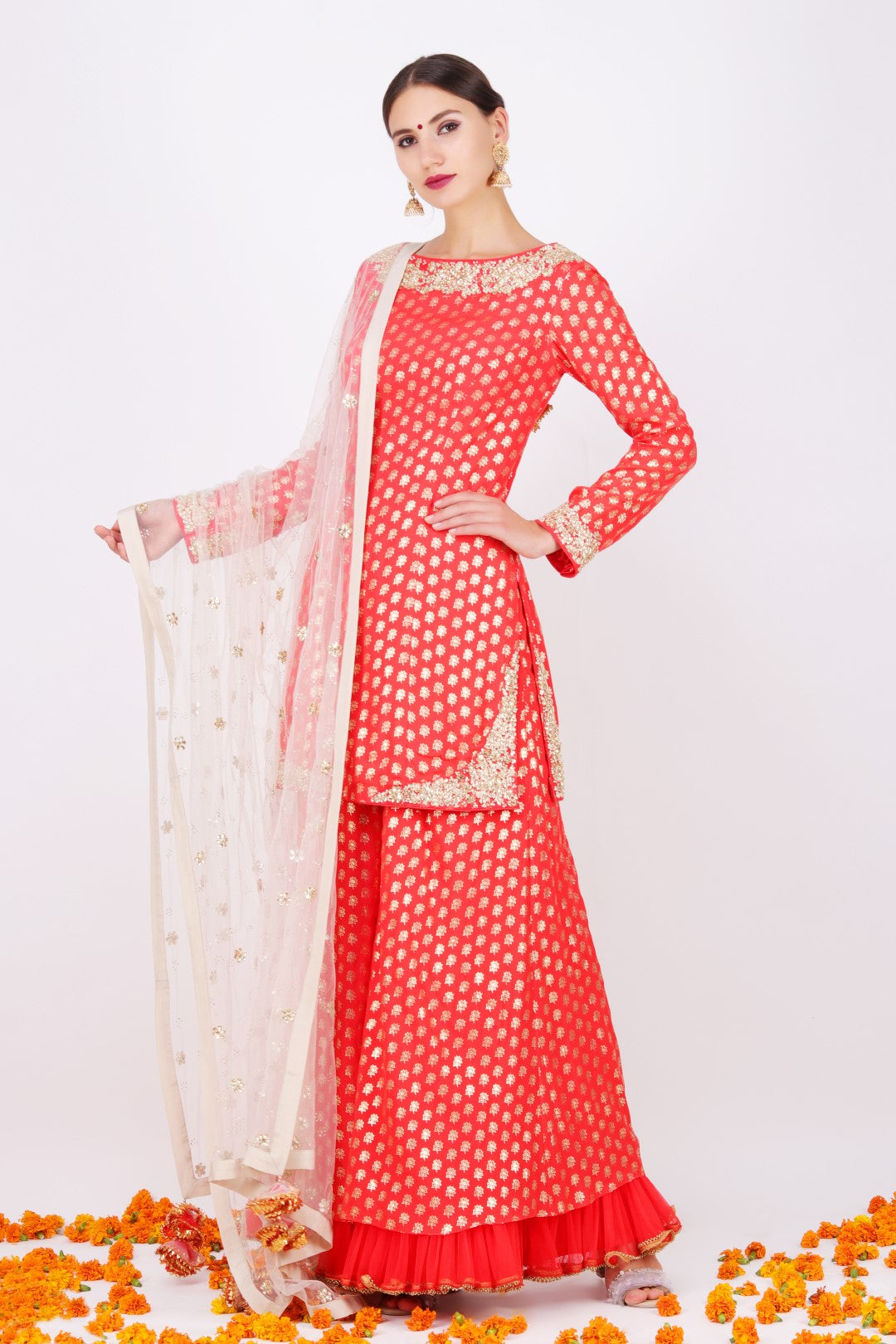 Gajari crepe lotus foil printed short kurta with crepe lotus foil printed wide leg pant and ghee mukesh net embroidered dupatta.