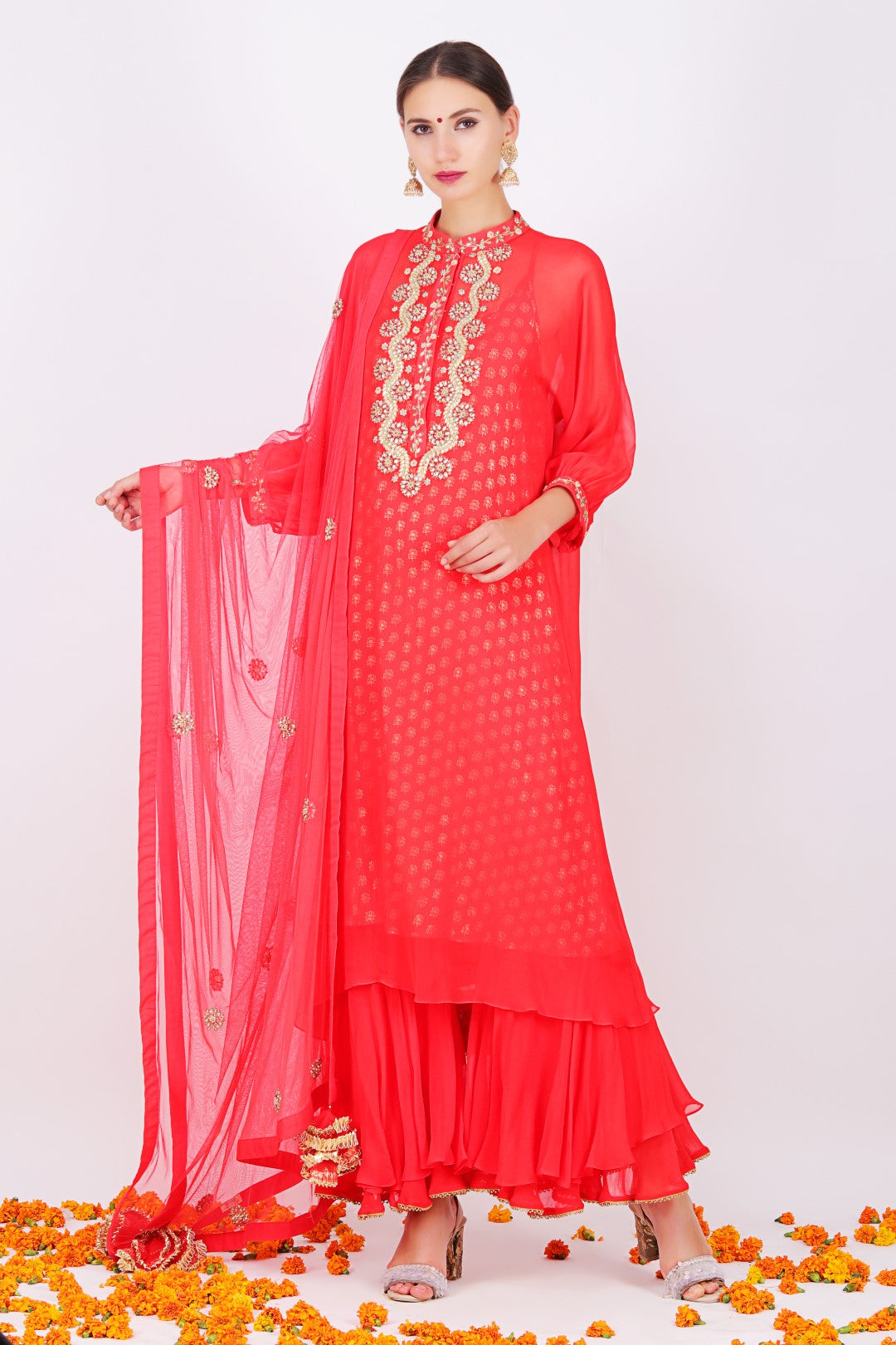 Gajari georgette kaftan sleeves kurta with gajari georgette double layer sharara and gajari net embroidered dupatta.