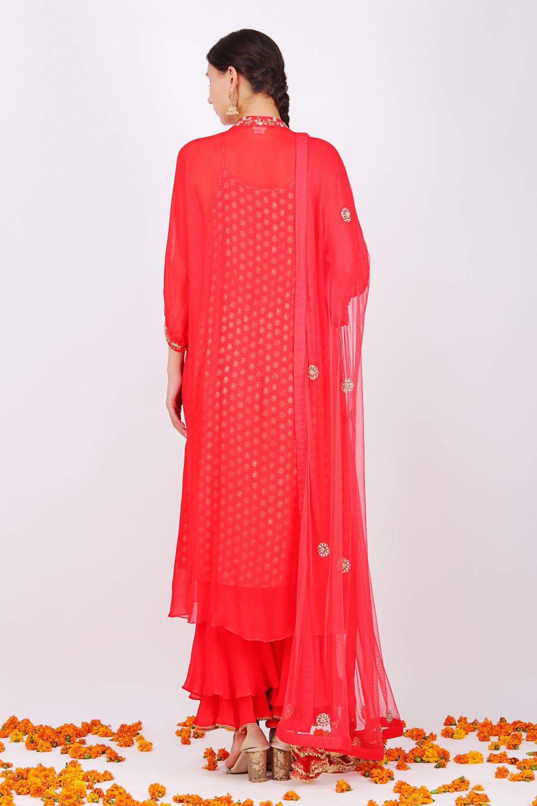 Gajari georgette kaftan sleeves kurta with gajari georgette double layer sharara and gajari net embroidered dupatta.