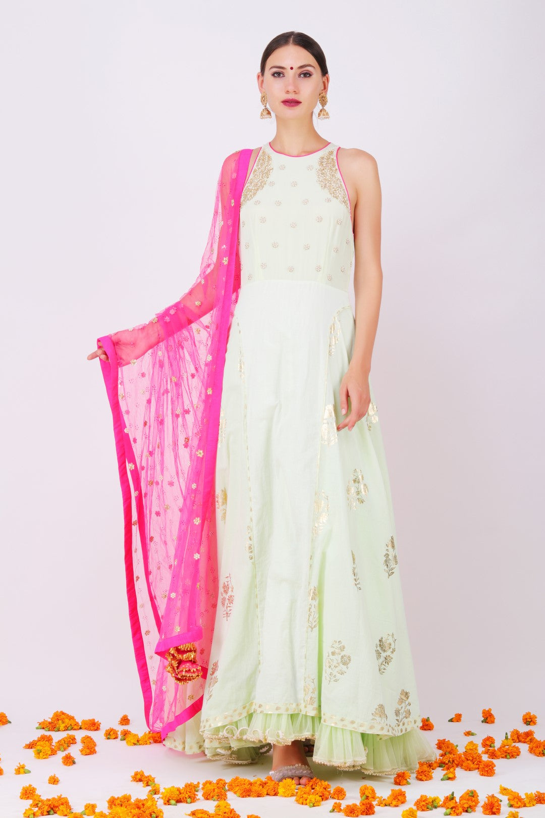 Pista embroidered yoke kalidar with rani pink net embroidered dupatta and churidar.