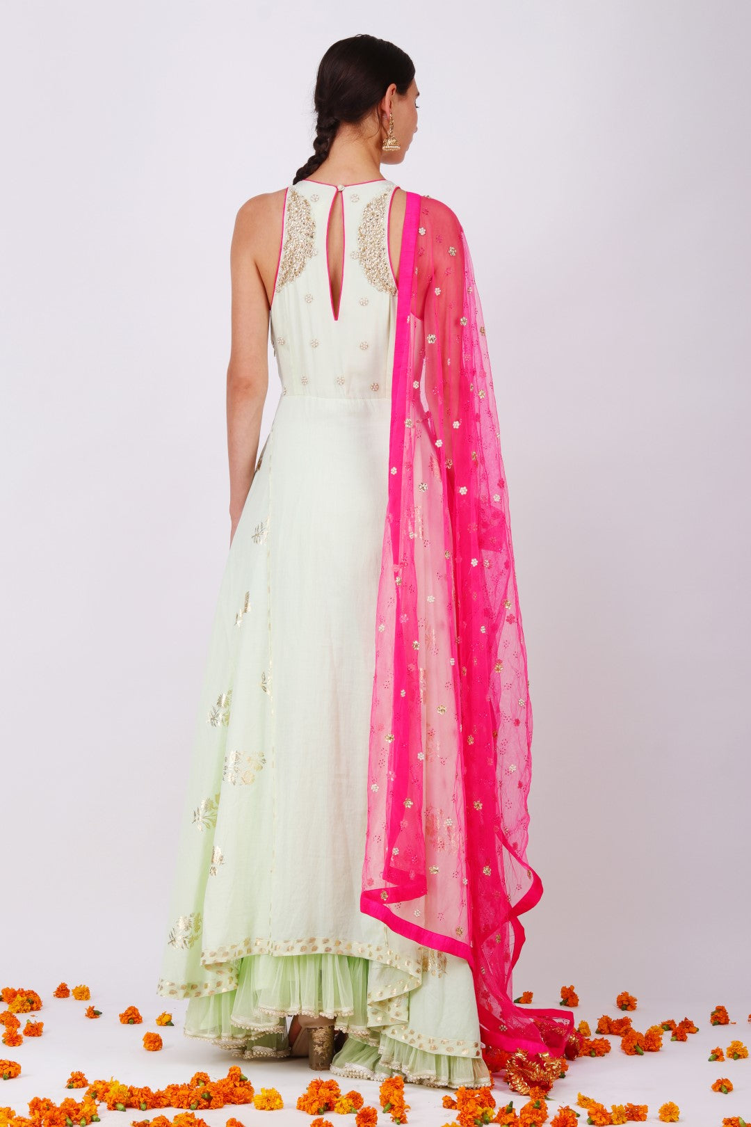 Pista embroidered yoke kalidar with rani pink net embroidered dupatta and churidar.