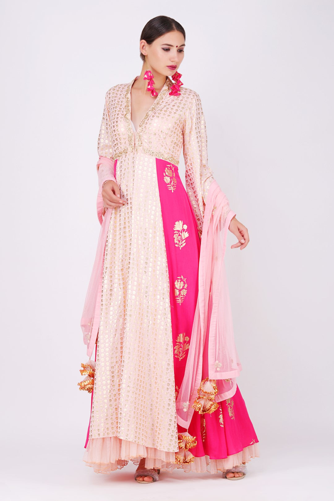 Rose pink  chhotu sanga foil printed raised neckline kalidar with rose pink net embroidered dupatta and churidar.