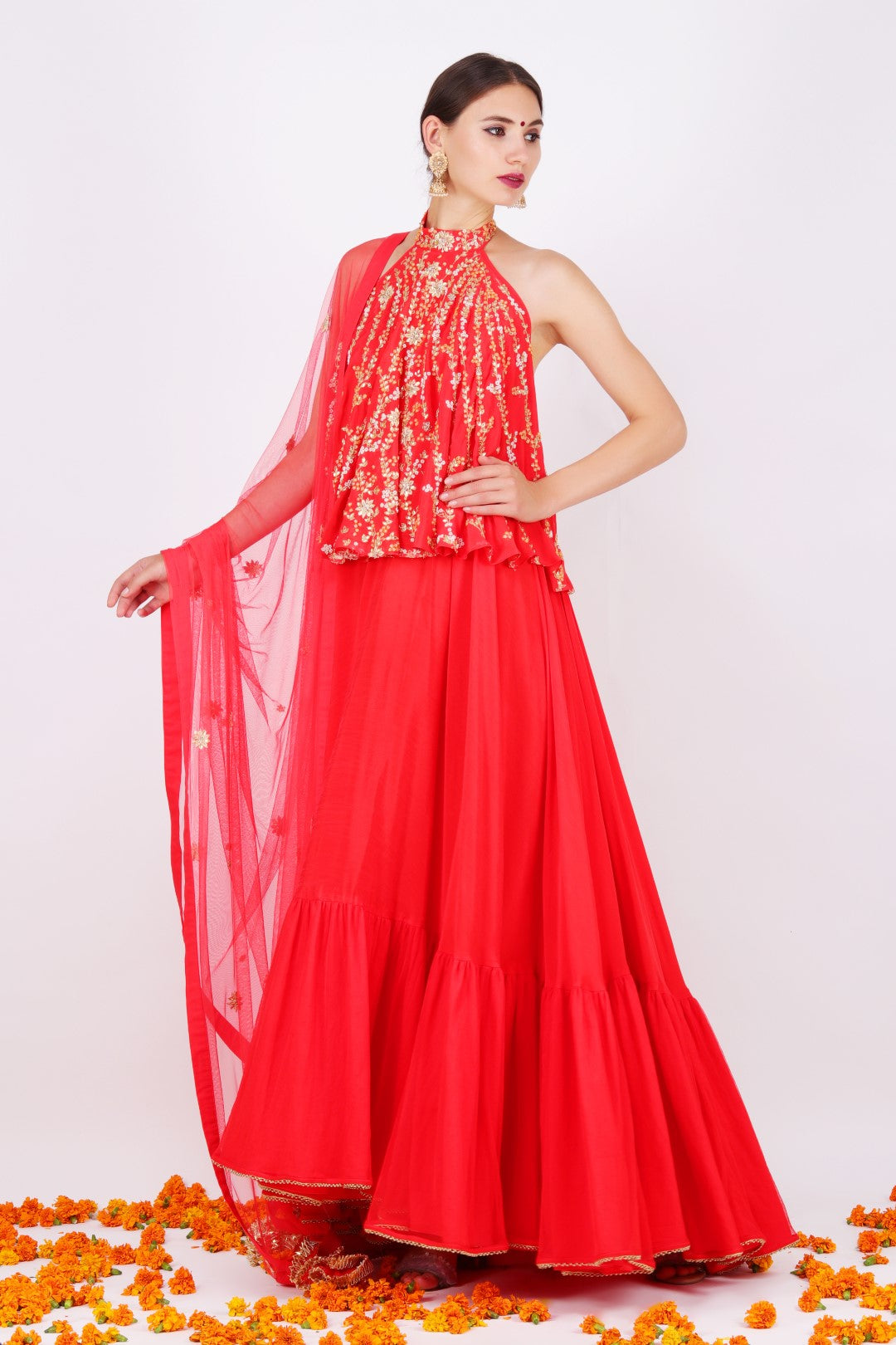 Gajari crepe halter neck kalidar with gajari net embroidered dupatta and churidar.