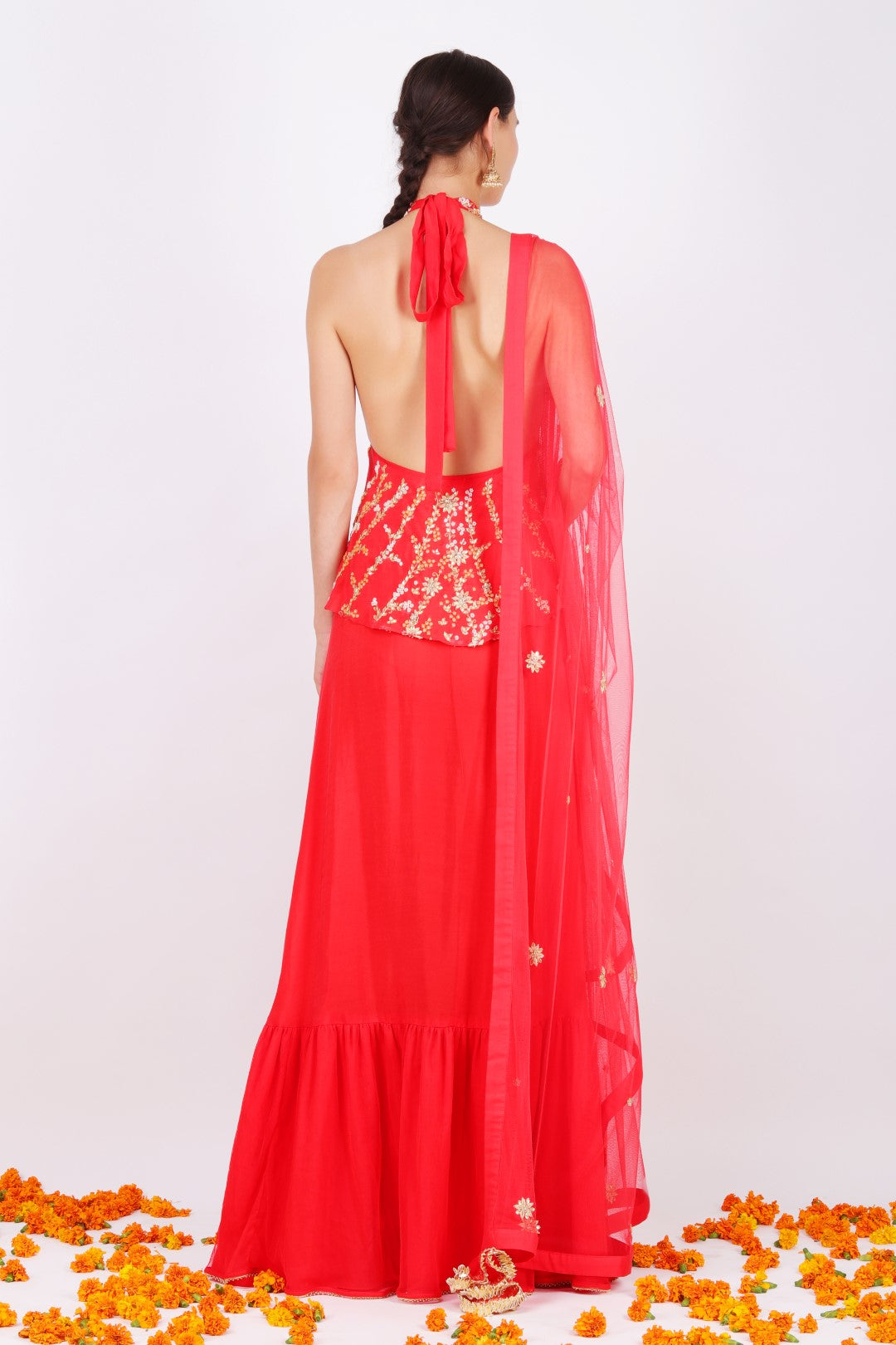 Gajari crepe halter neck kalidar with gajari net embroidered dupatta and churidar.