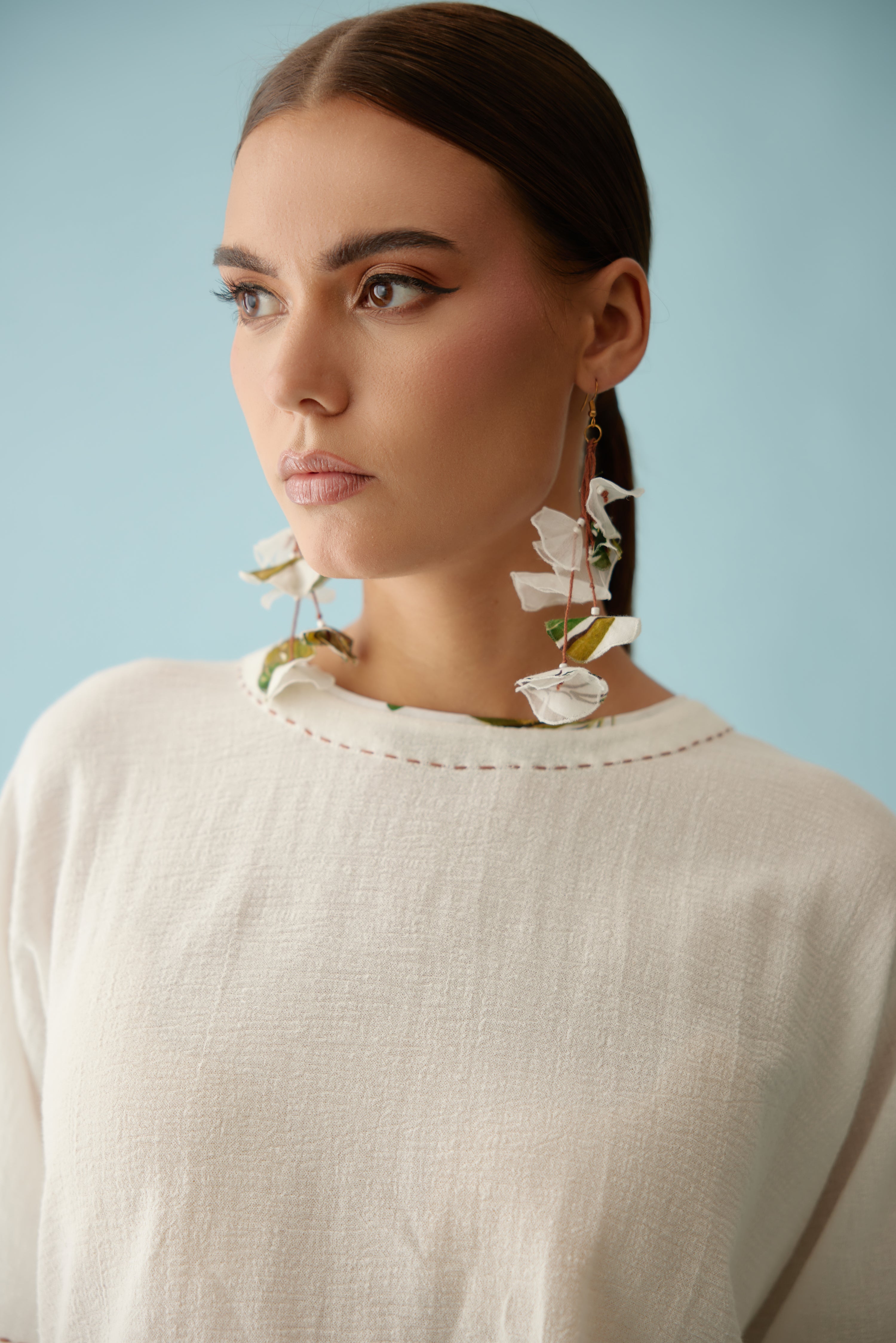 Cream recycled asymmetrical banana tree tassels earrings