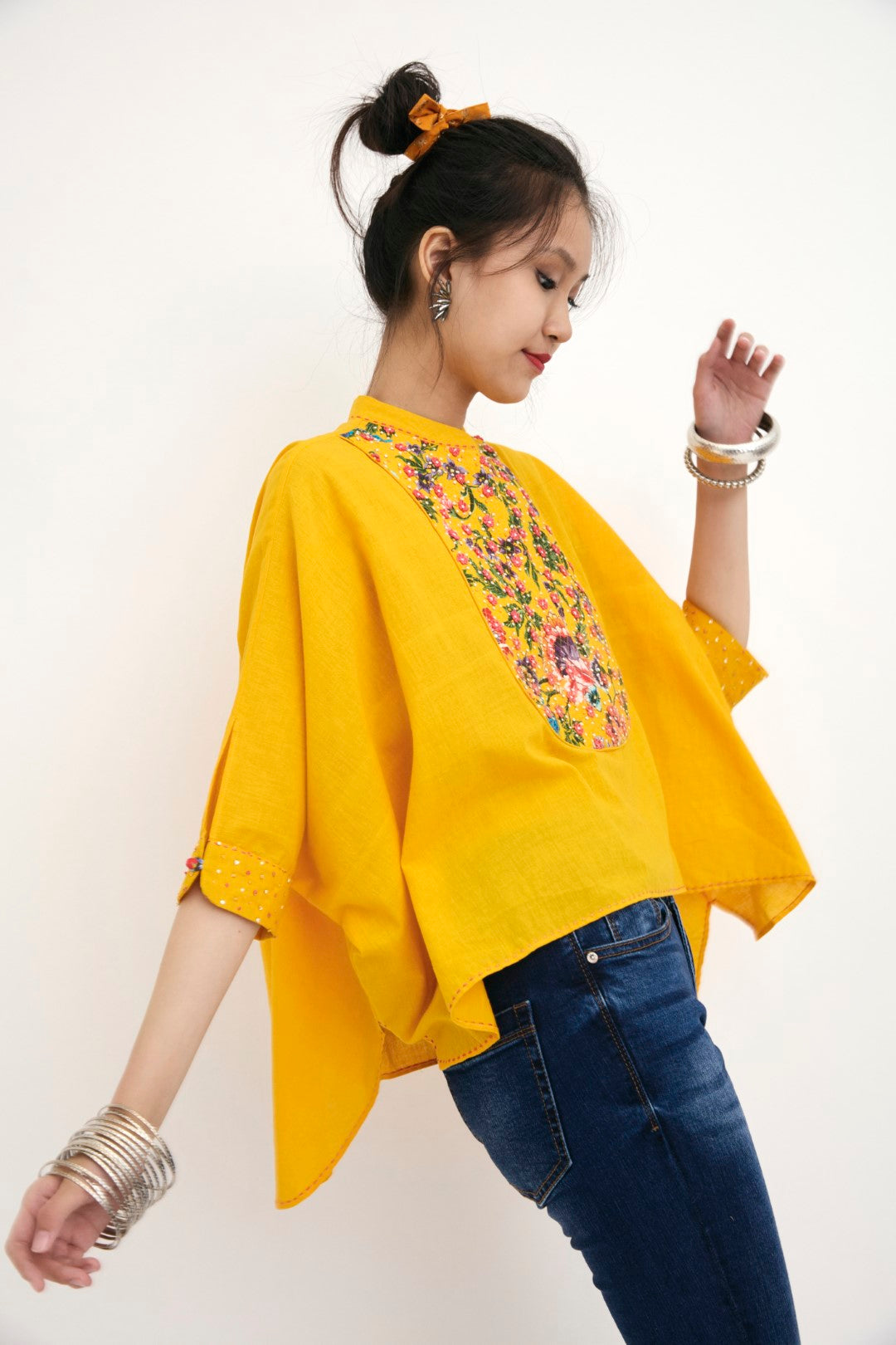 "Handwoven & hand-painted yellow chintz print with hand-embroidered along with beads, sequins & french knots. 100% Handwoven cotton; Lining: 100% cotton  100% Azo Free Dry Clean Only"