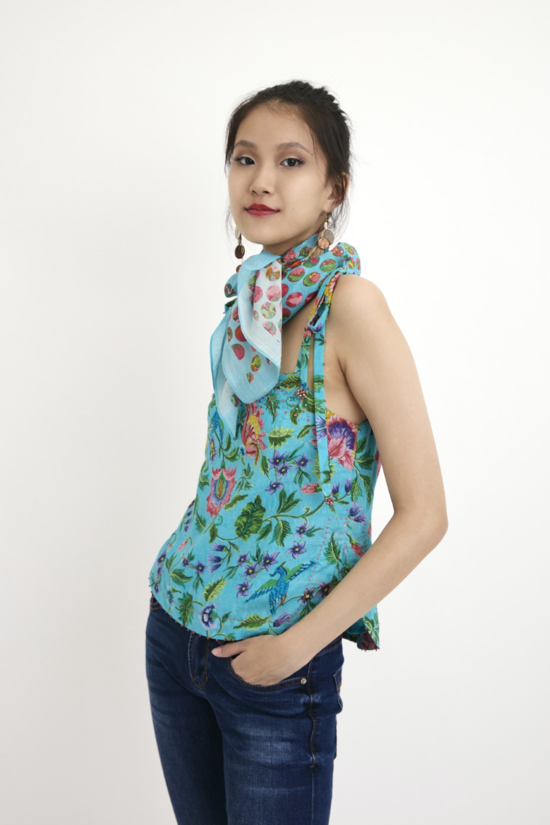 "Handwoven blue hand-painted chintz printed camisole in handwoven silk cotton, embellished with french knots and sequins. 100% Handwoven cotton silk; Lining:100% cotton 100% Azo Free Dry Clean Only"